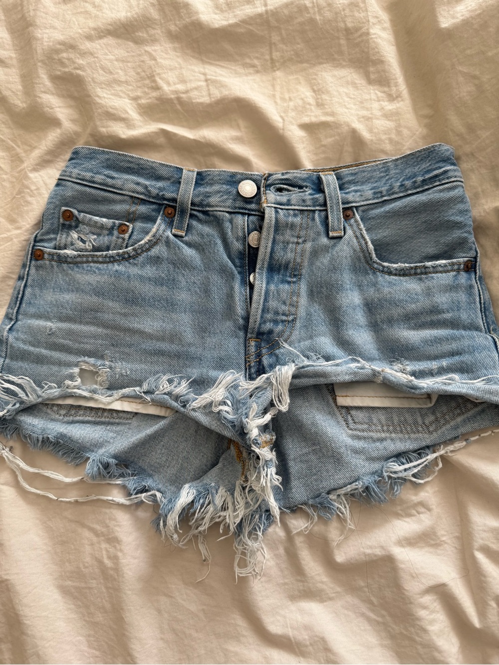 Levi’s Blue Distressed Denim Shorts 501